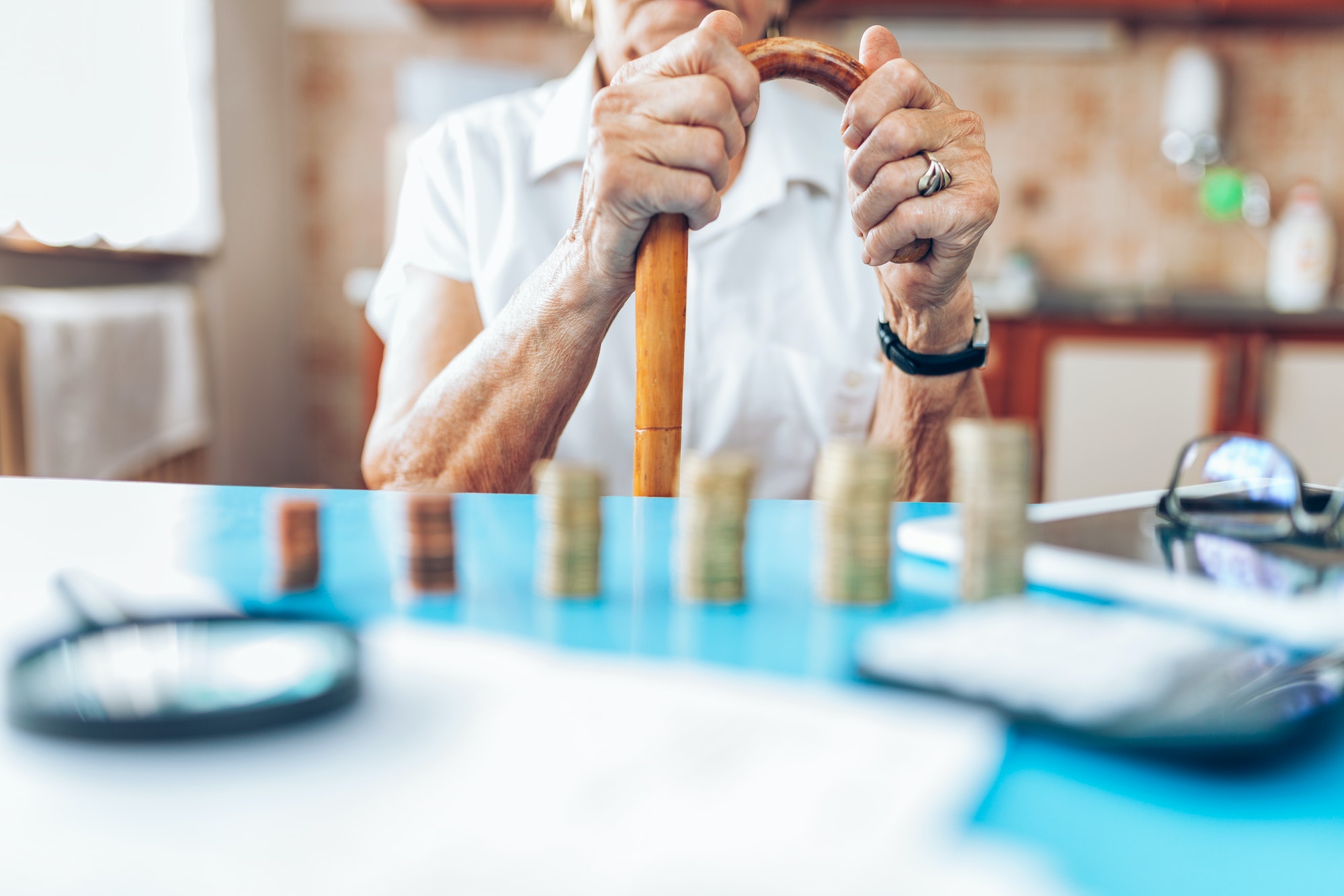 Senior woman checking her finances and investments